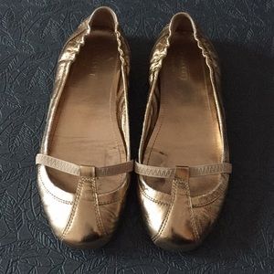 used coach gold ballet flats